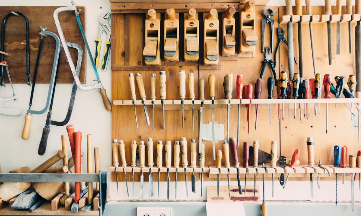 A carpenter's wall of well-kept hand tools